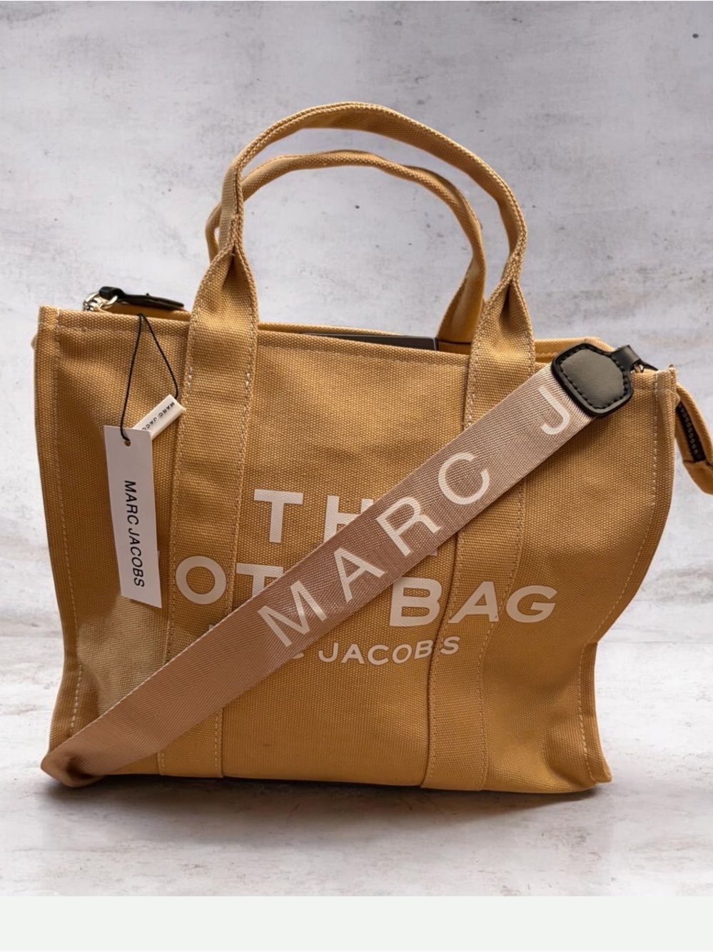 Marc Jacobs The Jacquard Tote Bag in the color Camel.